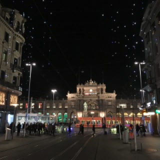 The Zurich Hauptbahnhof, main railway station, at night from Bahnhofstrasse with Christmas lights.